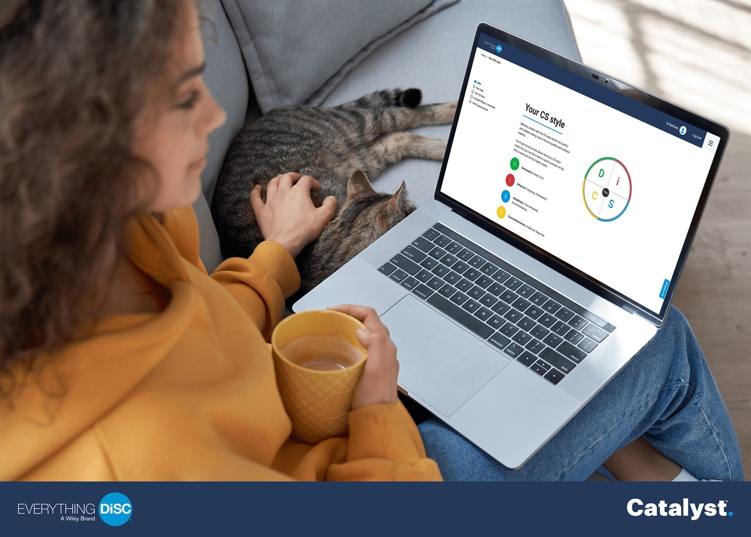 A professional reviewing her personalised Everything DiSC style profile on the Catalyst platform on a laptop